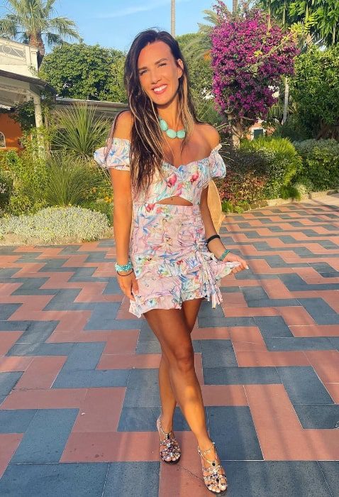 Natalie Burn smiling for a picture in Italy in July 2022 (Natalie Burn / Instagram) Natalie Burn smiling for a picture in Italy in July 2022