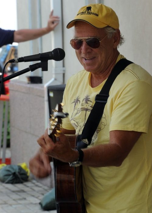 Jimmy Buffet performs for members of Joint Task Force Haiti behind the U.S. Embassy in Port-au-Prince, Haiti, March 3, 2010 (MCCS Spike Call / Wikimedia / Public Domain) Jimmy Buffet performs for members of Joint Task Force Haiti behind the U.S. Embassy in Port-au-Prince, Haiti, March 3, 2010
