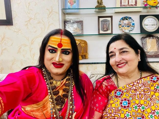 Laxmi Narayan Tripathi (Left) as seen while smiling for a picture with singer Anuradha Paudwal in November 2021 (Laxmi Narayan Tripathi / Instagram) Laxmi Narayan Tripathi (Left) as seen while smiling for a picture with singer Anuradha Paudwal in November 2021