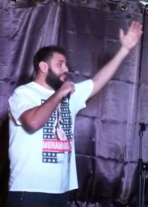 Mohammed Amer performing at the 1001 Laughs Comedy Festival in Ramallah, Palestine in 2016 (Fjmustak / Wikimedia / CC BY-SA 4.0) Mohammed Amer performing at the 1001 Laughs Comedy Festival in Ramallah, Palestine in 2016